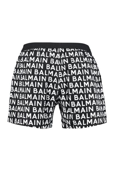 Shop Balmain Printed Swim Shorts In Black