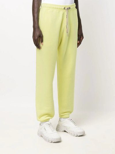 Shop Palm Angels Logo-print Track Pants In Gelb