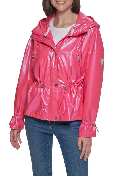 Shop Guess Hooded Holographic Anorak Rain Coat In Bubble Gum