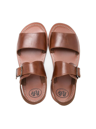 Shop Pèpè Buckled Leather Sandals In Brown