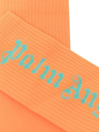 Shop Palm Angels Logo Print Ribbed Socks In Orange