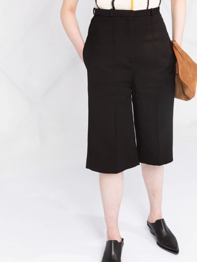 Totême Cropped Tailored Trousers In Black