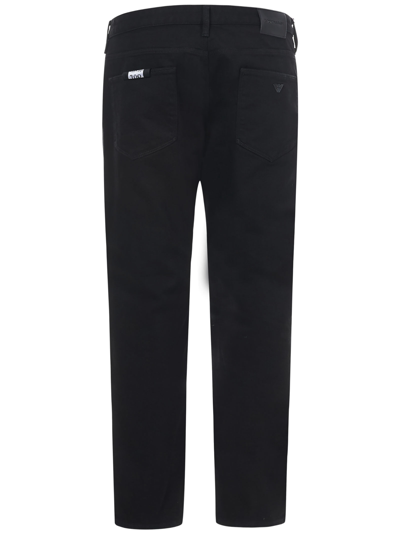 Shop Emporio Armani J06 Jeans In Black