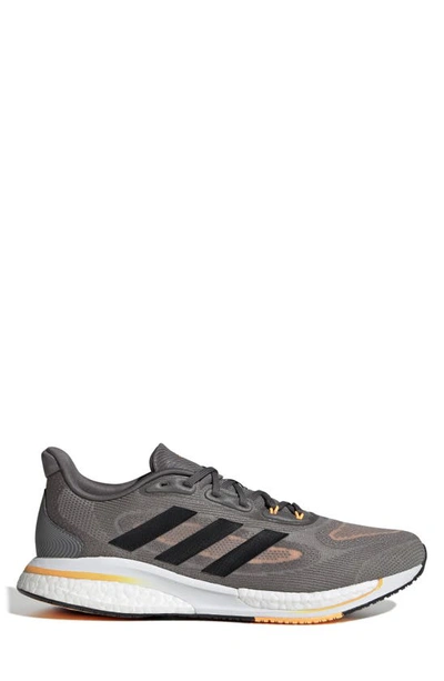 Shop Adidas Originals Supernova Running Shoe In Grey Four/ Black/ Orange