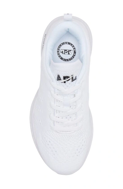 Shop Apl Athletic Propulsion Labs Techloom Pro Knit Running Shoe In White/ Black/ Gum