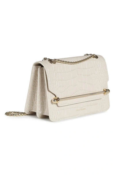 Shop Strathberry Mini East/west Croc Embossed Leather Crossbody Bag In Vanilla