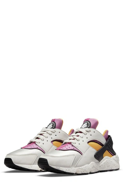 Shop Nike Air Huarache Sneaker In Bone/ Gold/ Black/ Lethal Pink