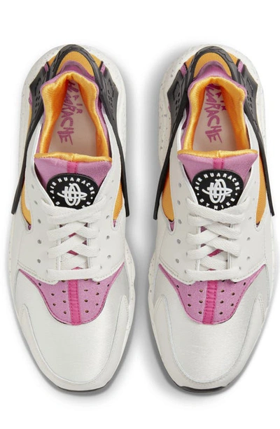 Shop Nike Air Huarache Sneaker In Bone/ Gold/ Black/ Lethal Pink