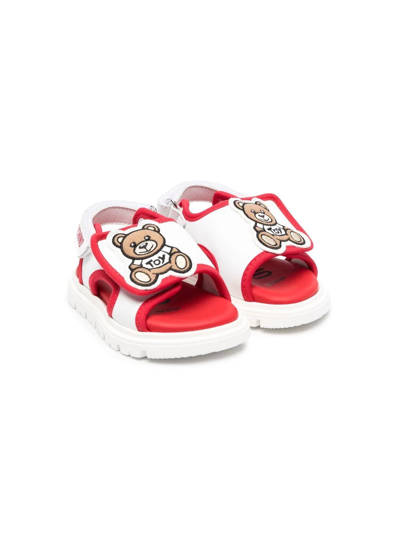 Shop Moschino Logo Slingback Sandals In White
