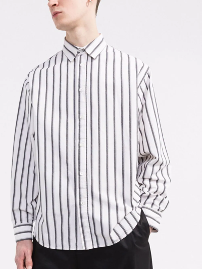 THERE WAS ONE UTILITARIAN STRIPED SHIRT 