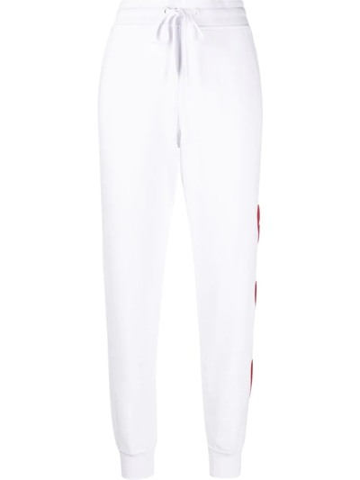 Shop Love Moschino Heart Logo-patch Cut-out Track Pants In Weiss