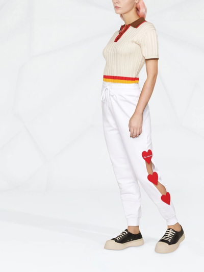 Shop Love Moschino Heart Logo-patch Cut-out Track Pants In Weiss