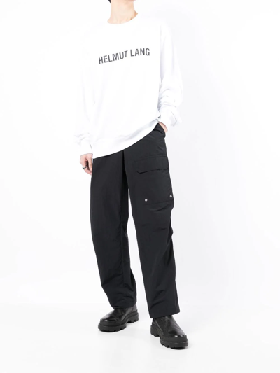 Shop Helmut Lang Patch-pocket Loose Fit Trousers In Schwarz
