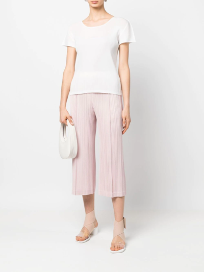 Shop Issey Miyake Plissé-detail Cropped Trousers In Rosa