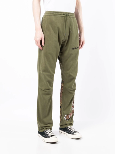 Shop Maharishi Tiger-motif Track Pants In Green
