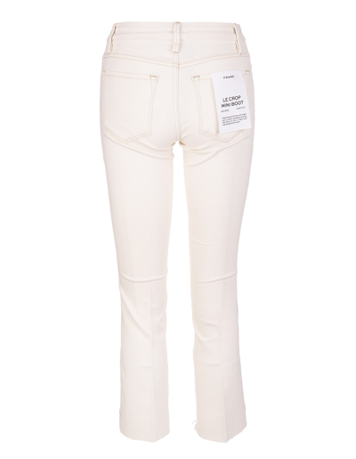 Shop Frame Woman Ecru Le Crop Mini Boot Jeans In White