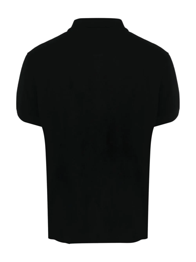 Shop Moschino Logo-print Polo Shirt In Black