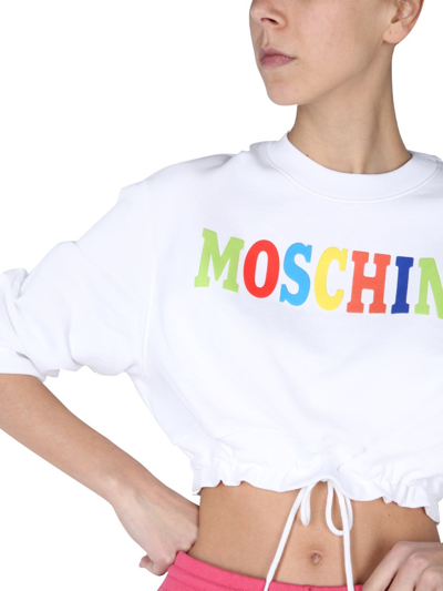 Shop Moschino Flocked Multicolor Logo Sweatshirt In White