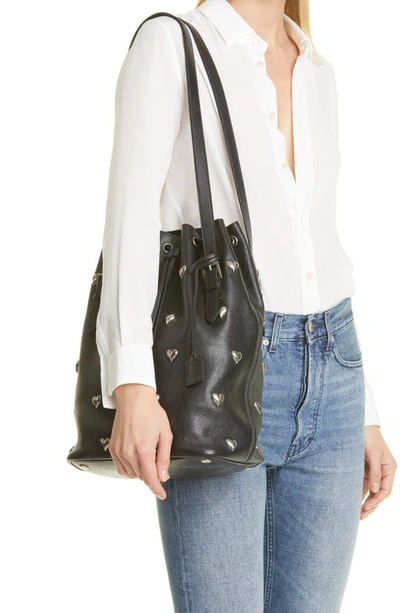 Shop Saint Laurent Medium Seau Heart Studded Leather Bucket Bag In Nero/ Aged Silver