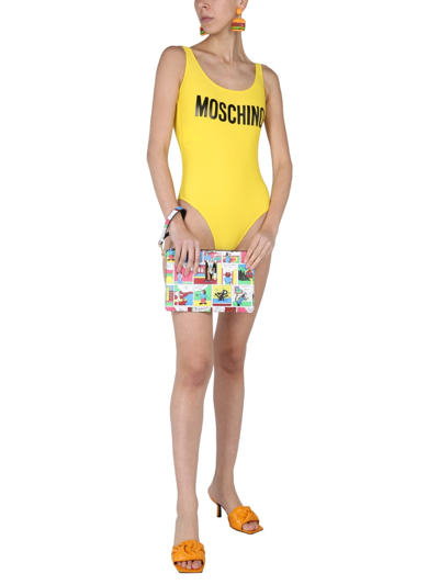 Shop Moschino Logo One Piece Swimsuit In Yellow