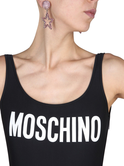 Shop Moschino Logo One Piece Swimsuit In Black