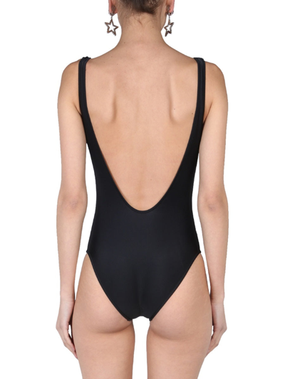 Shop Moschino Logo One Piece Swimsuit In Black