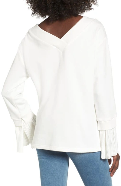 Shop Joa Ruffle Cuff Sweatshirt In Ivory