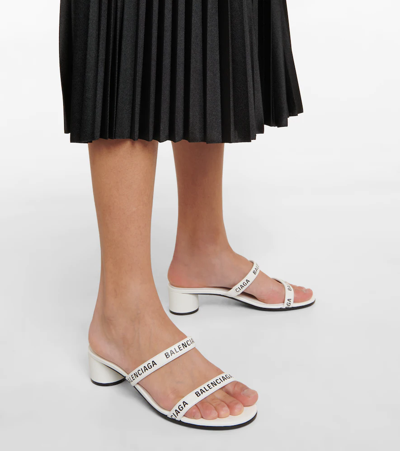 Shop Balenciaga Round Leather Sandals In White/black