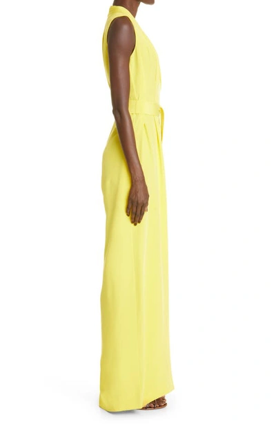 Shop Adam Lippes Belted Silk Crepe Jumpsuit In Citron