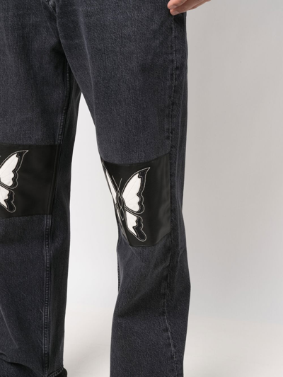 Shop Our Legacy Butterfly-patch Wide-leg Jeans In Schwarz