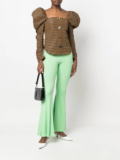 Shop Self-portrait Ribbed-knit Flared Trousers In Grün