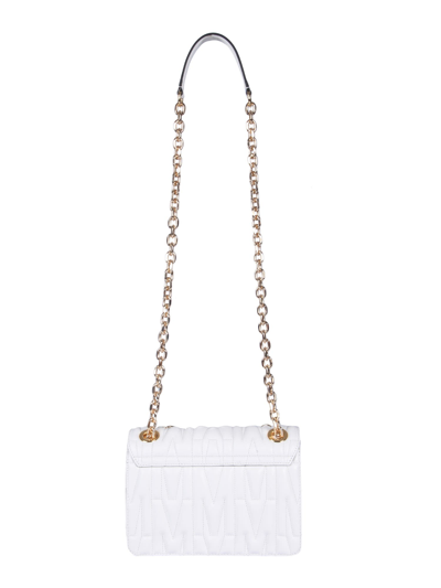 Shop Moschino Quilted Logo Shoulder Bag In Bianco