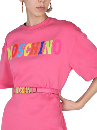 Shop Moschino Flocked Logo Dress In Fucsia