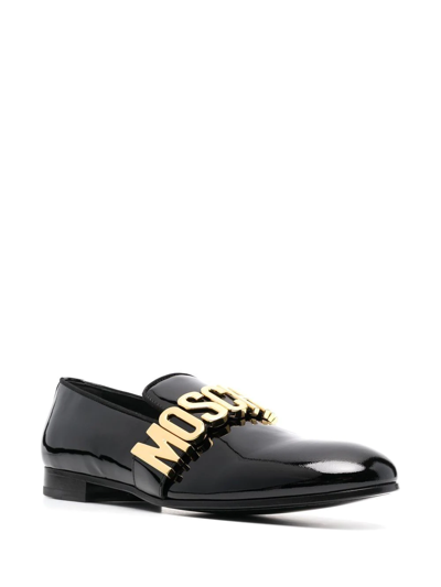 Shop Moschino Maxi Logo Lettering Loafers In Schwarz