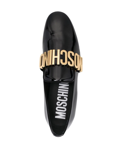 Shop Moschino Maxi Logo Lettering Loafers In Schwarz