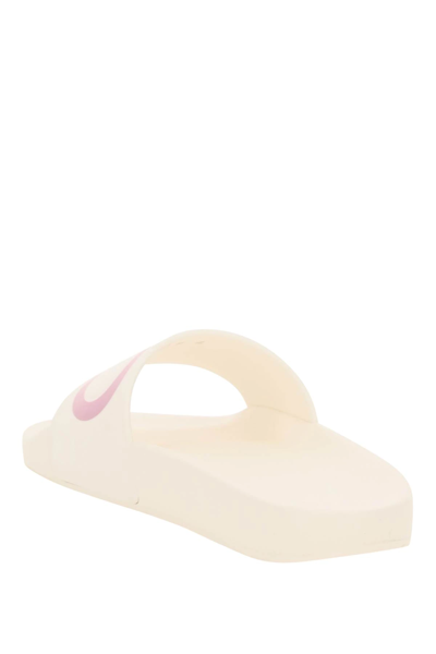 Shop Ferragamo Groovy Slippers With Logo In White,pink