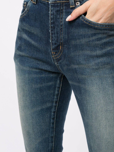 Shop Saint Laurent Faded Skinny Jeans