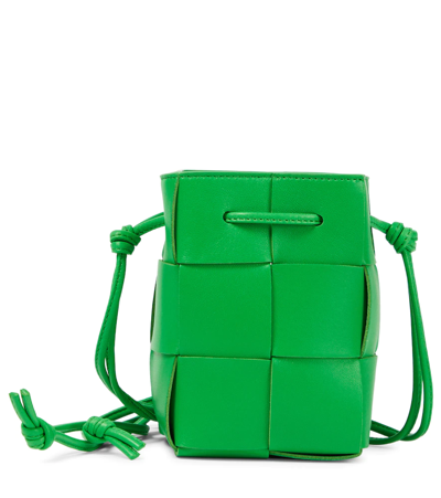 Bottega Veneta® Mini Cassette Bucket Bag in White / Parakeet. Shop online  now.