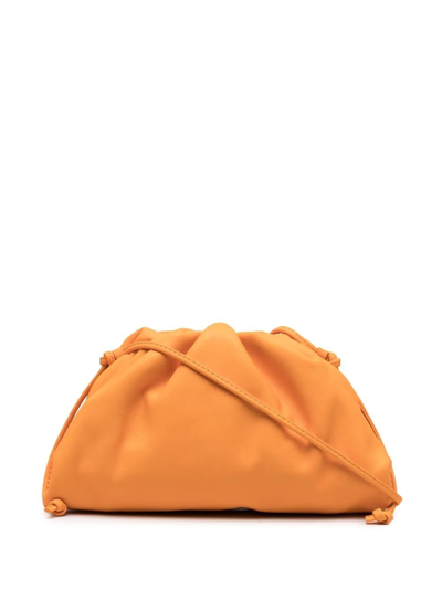 Shop Bottega Veneta Mini Leather Pouch Bag In Orange