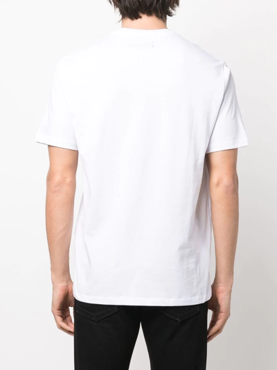 Shop Amiri Logo-print Short-sleeve T-shirt In White