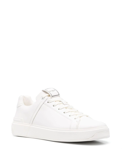 Shop Balmain Logo Low-top Sneakers In White