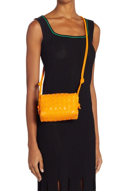 Shop Bottega Veneta Small Intrecciato Leather Crossbody Bag In Tangerine-gold