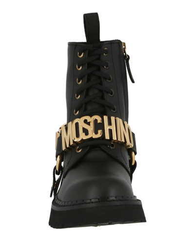 Shop Moschino Logo Leather Combat Boots In Black