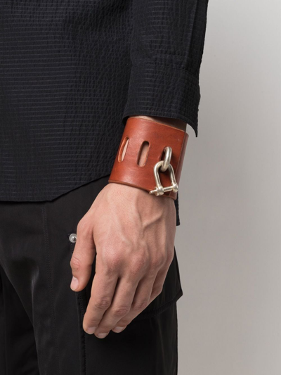 Parts Of Four Restraint Charm Bracelet In Braun