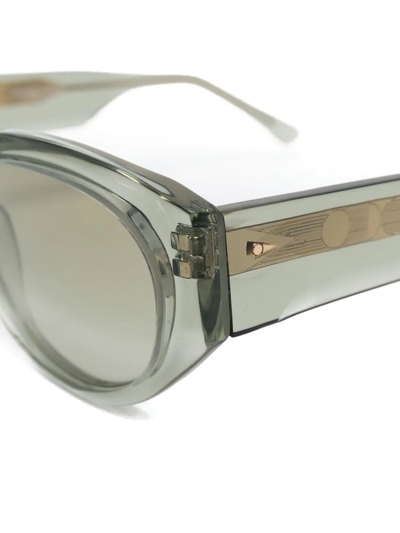 Shop Ahlem Les Amandiers Oval Sunglasses In Grau