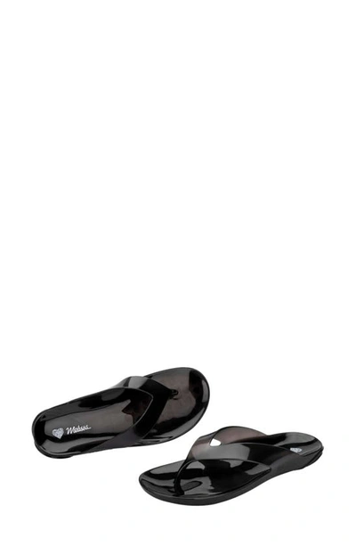 Shop Melissa The Real Jelly Flip Flop In Clear Black
