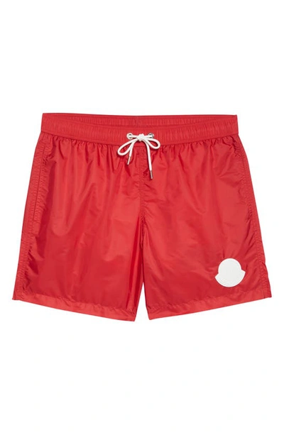 Shop Moncler Logo Patch Swim Trunks In 455-red