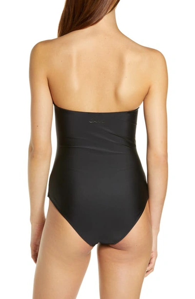 Shop Ganni Core Gathered One-piece Swimsuit In Black