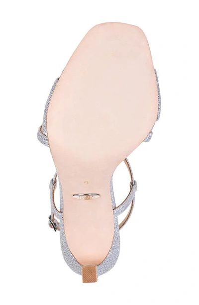Shop Badgley Mischka Ebiza Glitter Cross Strap Sandal In Silver Glitter