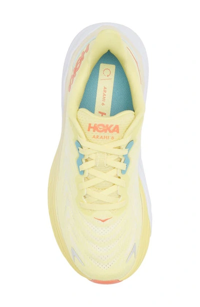 Shop Hoka One One Arahi 6 Running Shoe In Yellow Pear / Sweet Corn